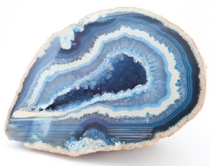 ​Agate is a translucent variety of microcrystalline quartz. Occurring in a wide range of colors, agate can be brown, white, red, gray, pink, black, and yellow. The color you see occurs in alternating bands within the agate, which are caused by impurities and minerals such as iron oxide, during the rocks formation. Agate is a porous material that readily accepts dye for extreme color patterns.